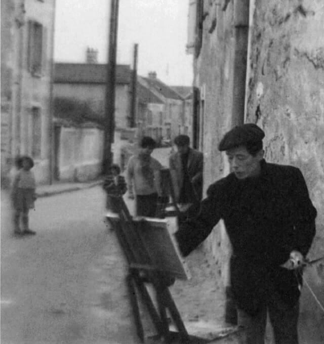 図4：1960年頃に野見山さんがパリ郊外で絵を描く様子を表す写真。